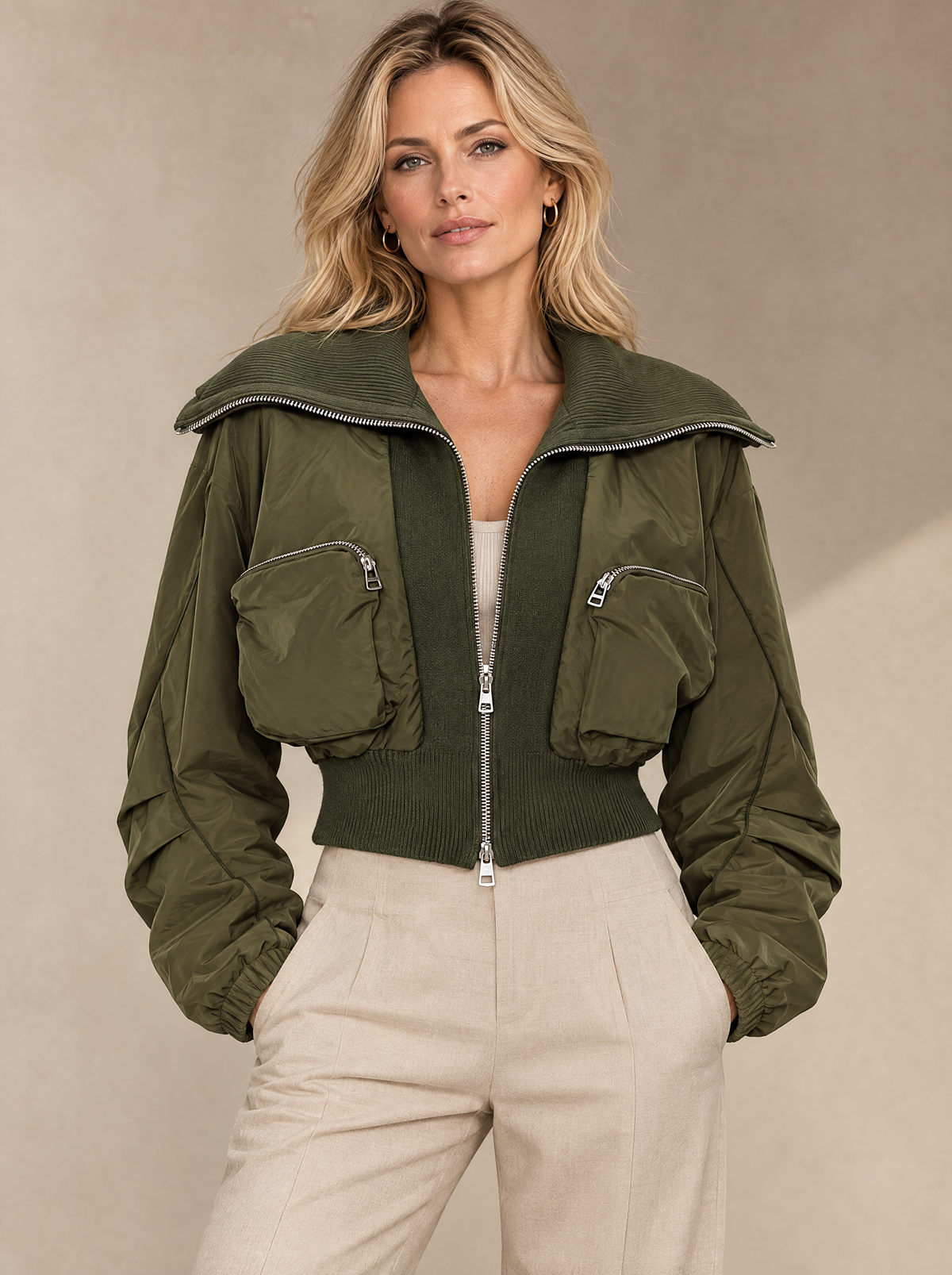 Blonde woman wearing the JXR0003 Cropped Utility Jacket in army green