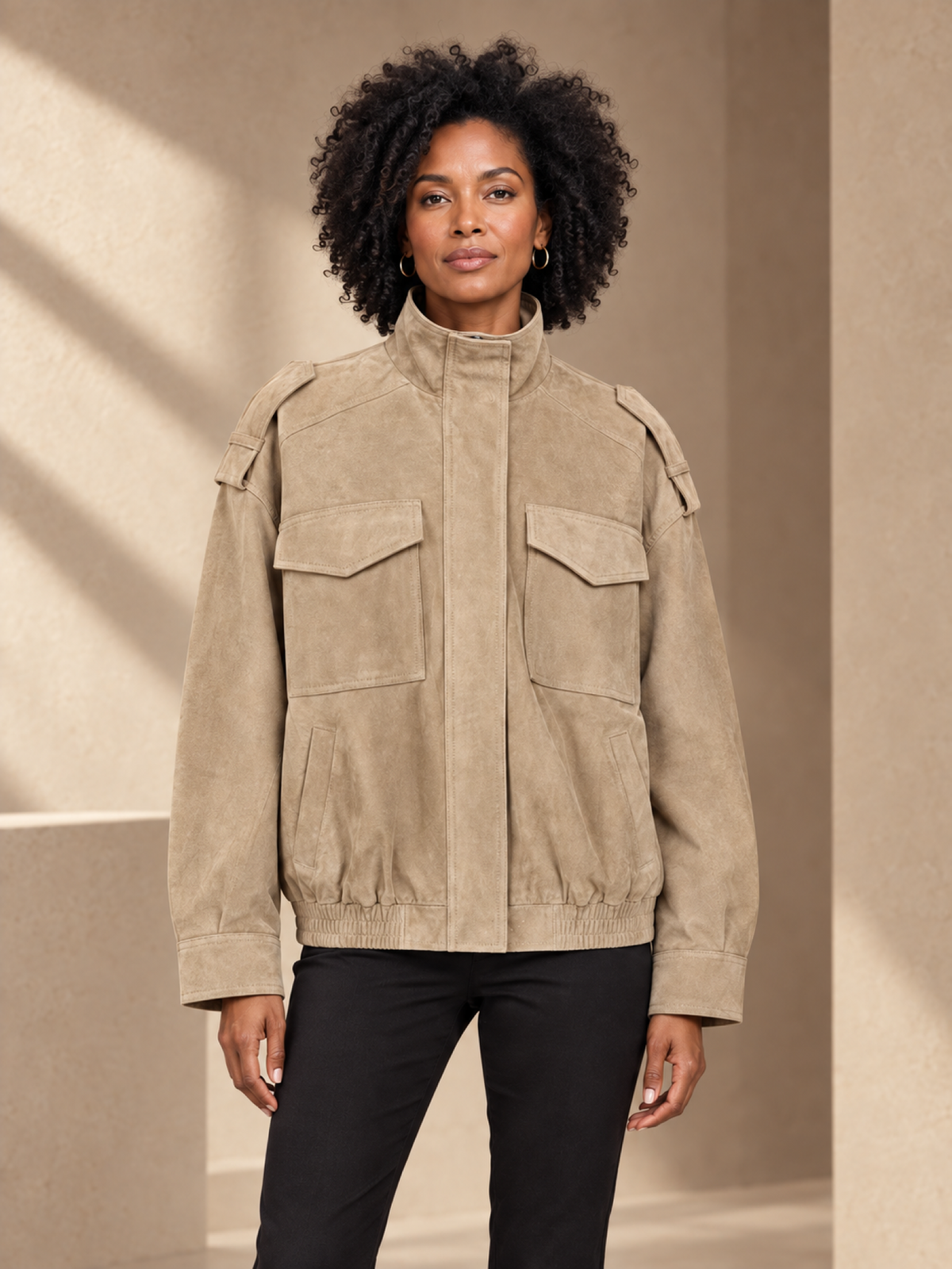 JXR1006 Utility Suede-Effect Bomber Jacket on a female model in a warm taupe studio, head-to-mid-leg view