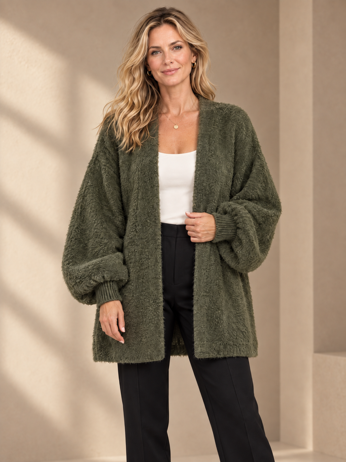 JXR2006 Plush Open-Front Cardigan on a female model in a warm taupe studio, head-to-mid-leg view