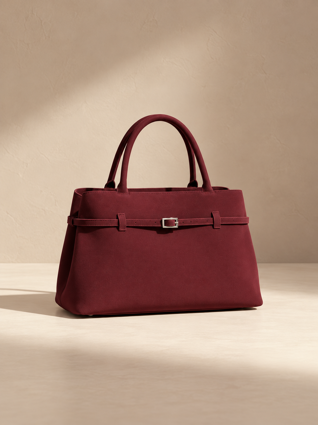 JXR4002 wine-red faux-suede tote on a warm ivory-beige studio background
